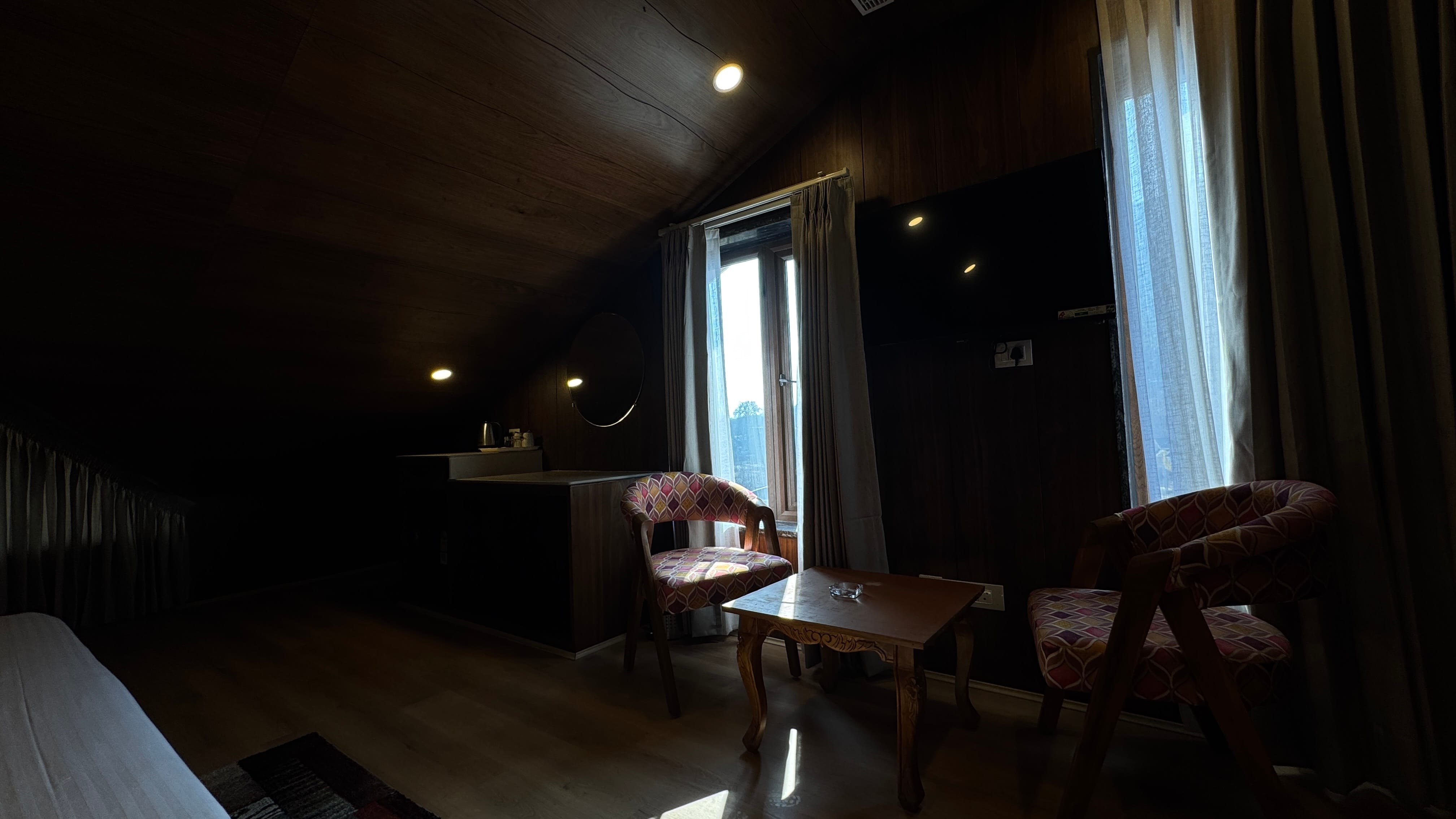Attic room bathed in soft natural light from the window